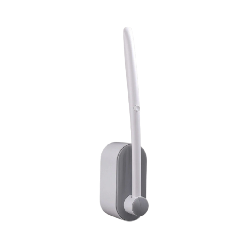 Hygienic disposable toilet brush with ergonomic handle and pre-loaded detergent sponge for eco-friendly cleaning.