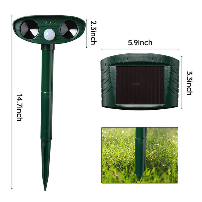 "Infrared solar animal pest repeller with ultrasonic technology in garden setting, solar panel atop a green weatherproof devi