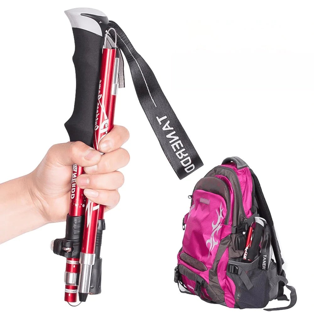 Lightweight foldable aluminium hiking poles with ergonomic EVA foam grips, ideal for trekking on various terrains.