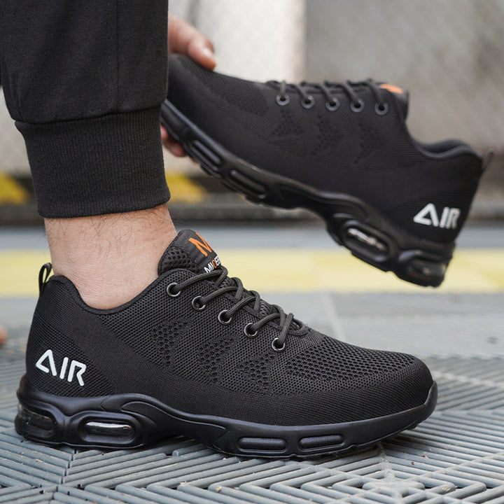 "Men's black waterproof safety shoes with steel toe, lightweight design, slip-resistant sole, ideal for workplace safety."