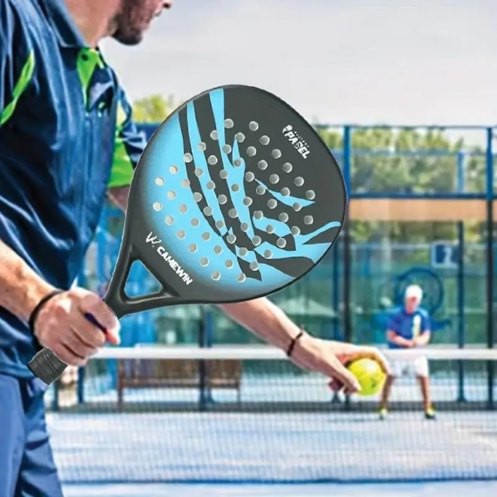 "Men’s carbon fibre paddle tennis racket, sleek design, ergonomic grip, lightweight for power and control on the court."