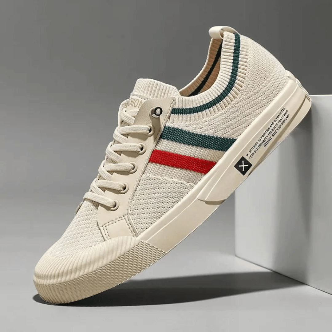 "Men's casual knit sneakers, breathable and lightweight with a lace-up design, shown in a stylish side view."