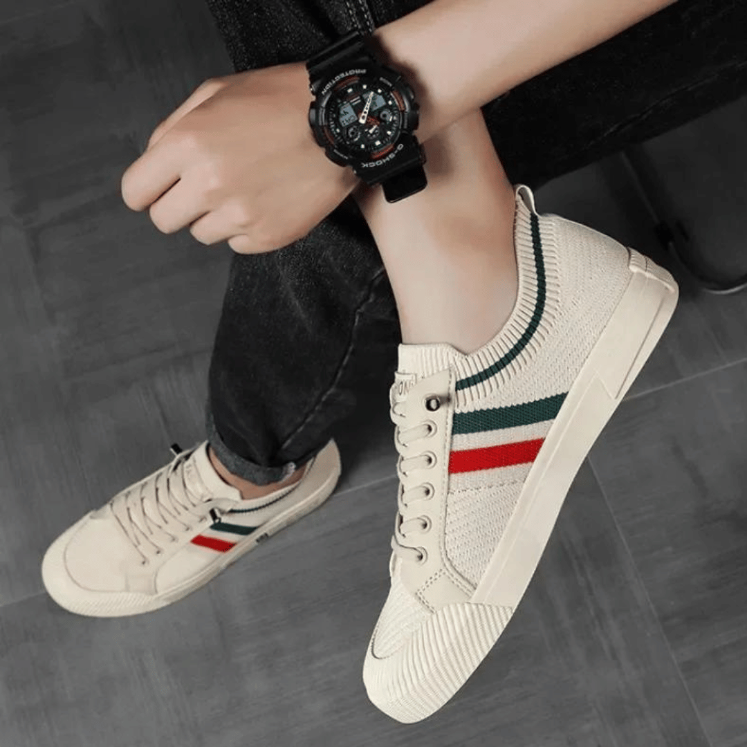 "Men's casual knit sneakers, breathable and lightweight with a lace-up design, shown in a stylish side view."
