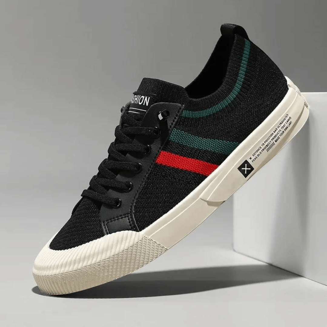 "Men's casual knit sneakers, breathable and lightweight with a lace-up design, shown in a stylish side view."