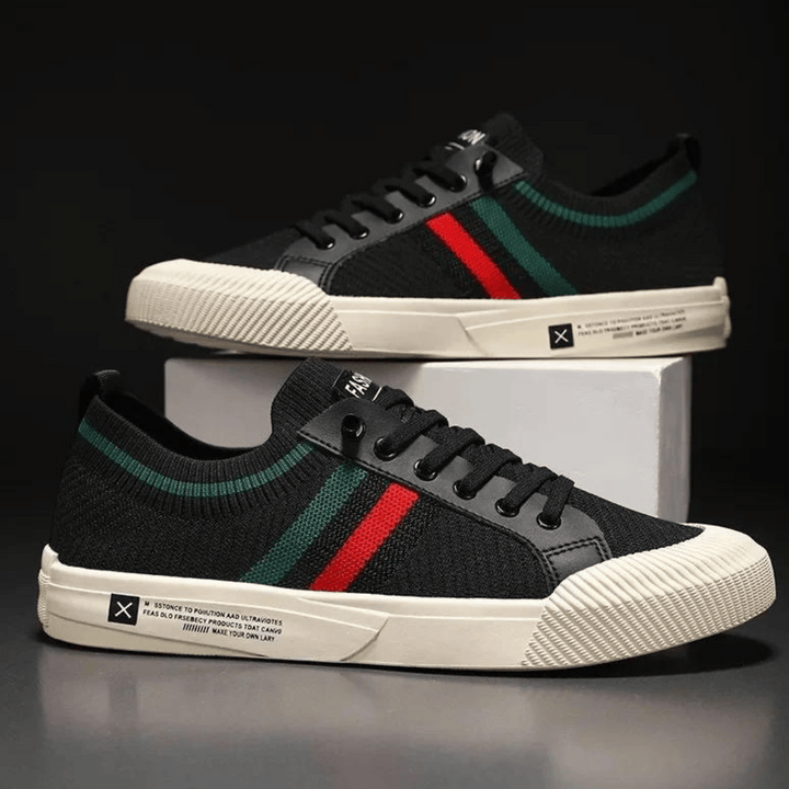 "Men's casual knit sneakers, breathable and lightweight with a lace-up design, shown in a stylish side view."
