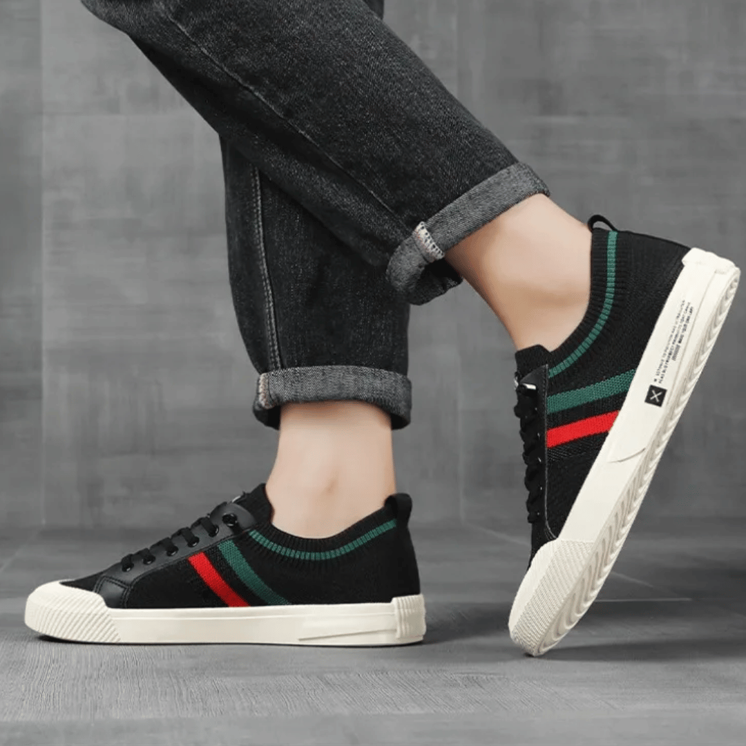 "Men's casual knit sneakers, breathable and lightweight with a lace-up design, shown in a stylish side view."