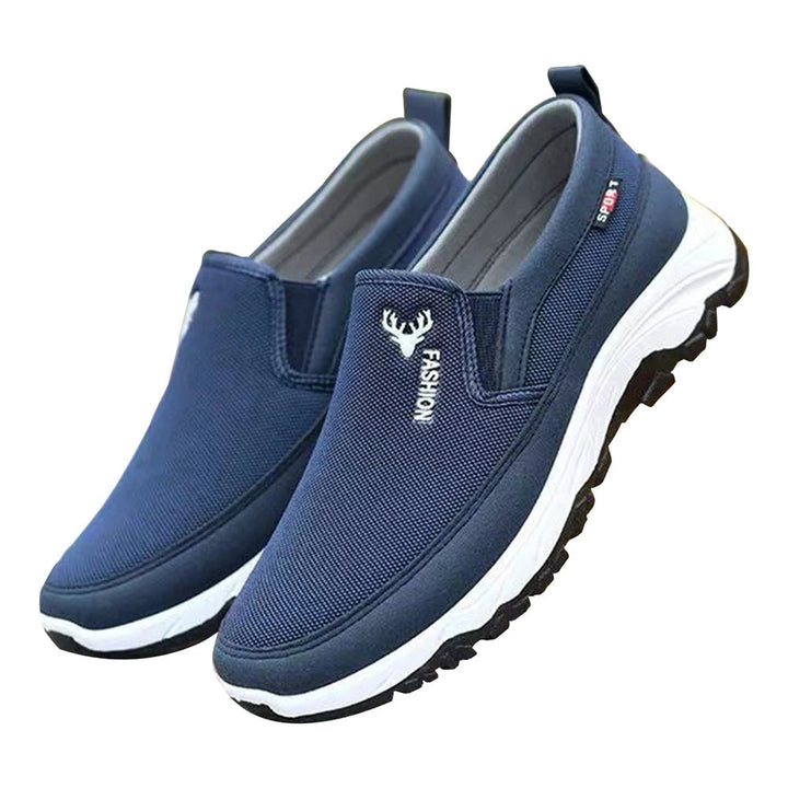 Men's cushioned slip-on walking shoes with breathable mesh, elastic panels, and grip outsole for comfort and stability.