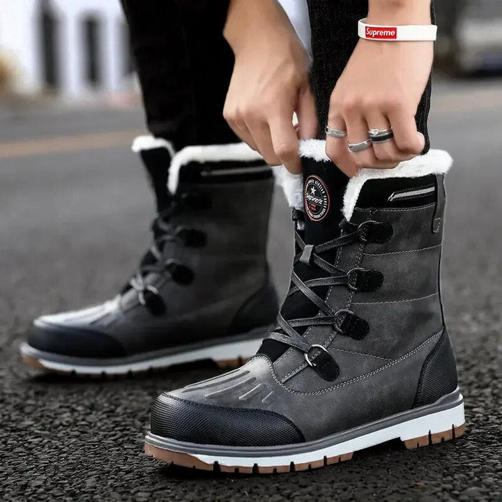 "Men's waterproof brown mid-calf snow boots with orthopedic support, lace-up, insulated for warmth, durable design."
