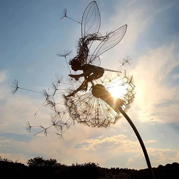 Metal fairy garden sculpture, weather-resistant, intricate design, black metal, adds whimsical charm to outdoor decor.