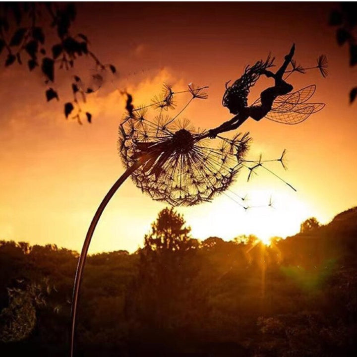 Metal fairy garden sculpture, weather-resistant, intricate design, black metal, adds whimsical charm to outdoor decor.