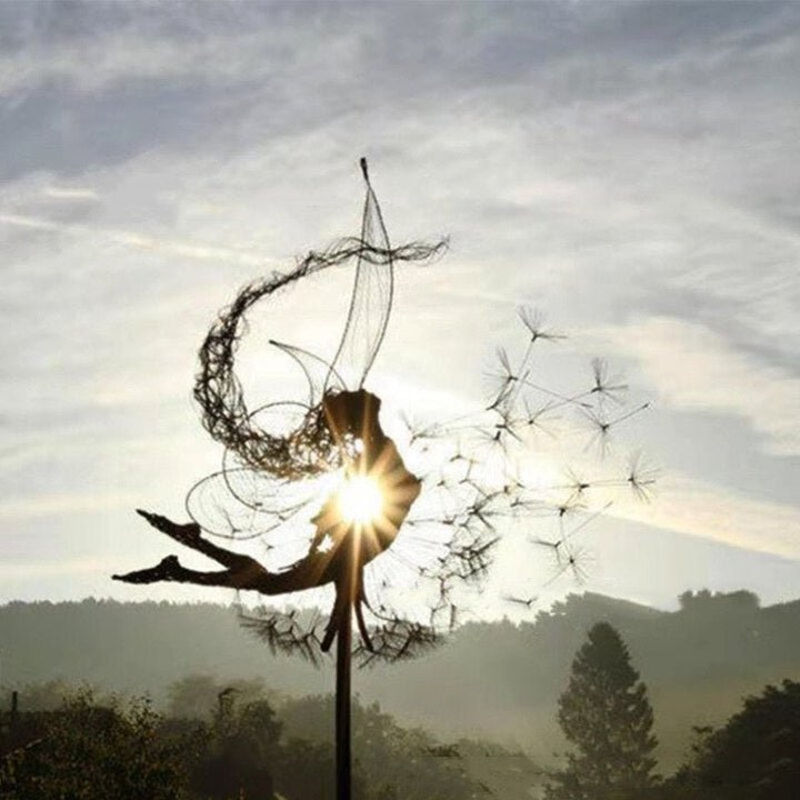Metal fairy garden sculpture, weather-resistant, intricate design, black metal, adds whimsical charm to outdoor decor.