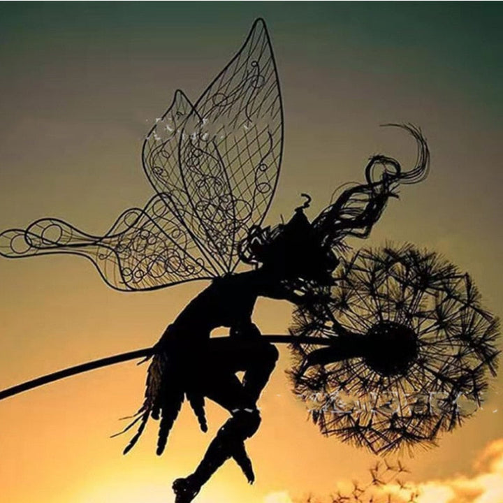 Metal fairy garden sculpture, weather-resistant, intricate design, black metal, adds whimsical charm to outdoor decor.