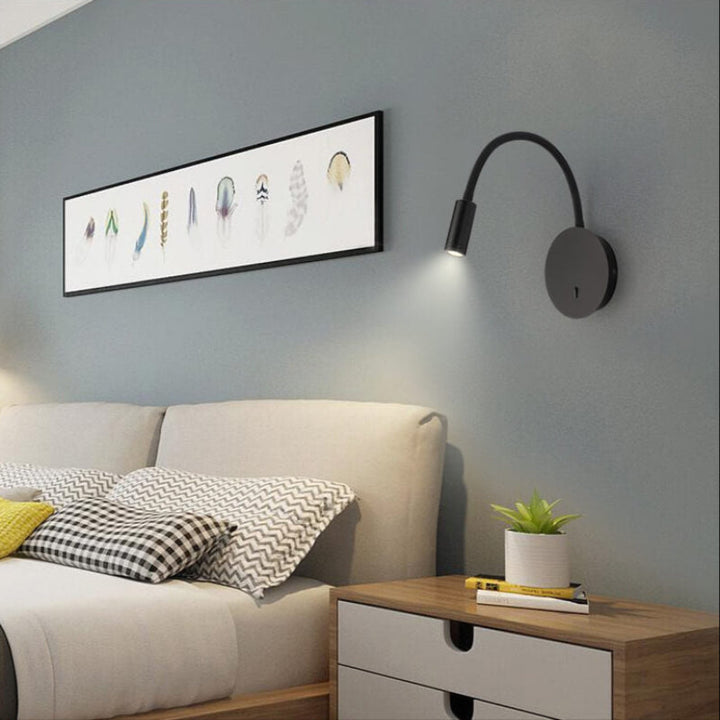 Modern 360° LED wall lamp, black and white, sleek design, aluminum and silicon, adjustable light, perfect for reading ambianc