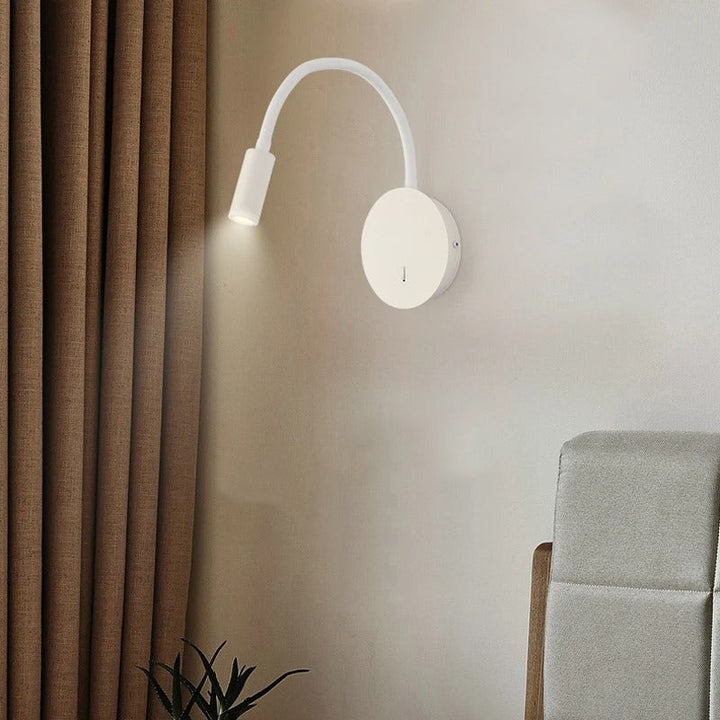 Modern 360° LED wall lamp, black and white, sleek design, aluminum and silicon, adjustable light, perfect for reading ambianc