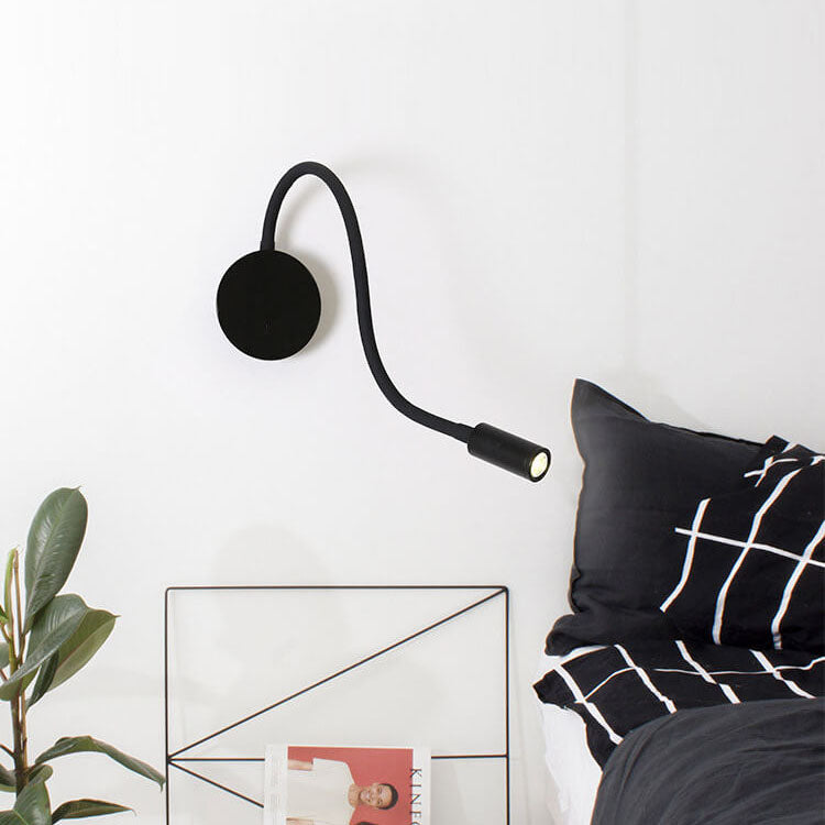 Modern 360° LED wall lamp, black and white, sleek design, aluminum and silicon, adjustable light, perfect for reading ambianc