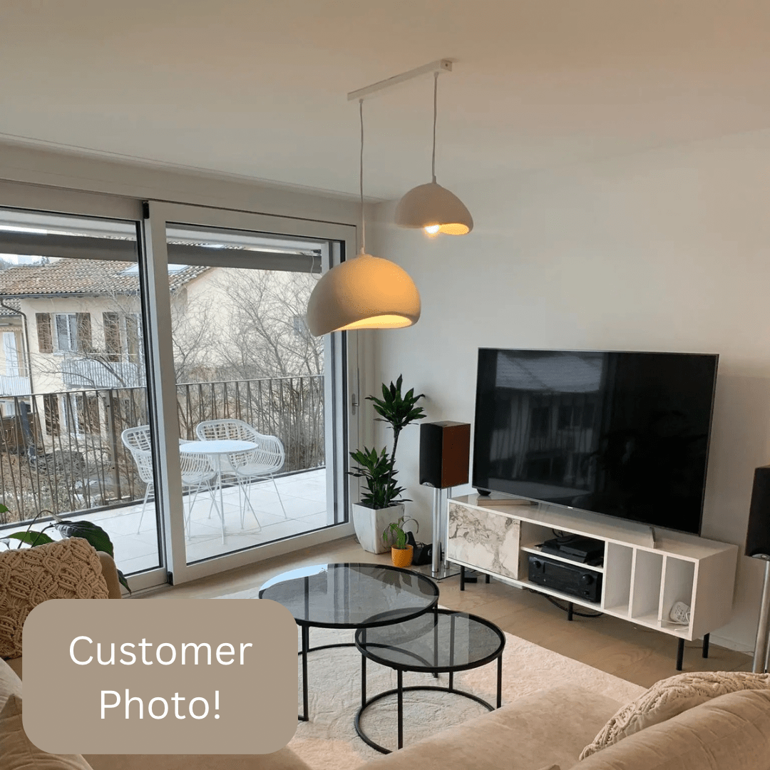 Modern Boho resin chandelier with soft glow, elegant design, and warm illumination; ideal for varied interiors and decor.