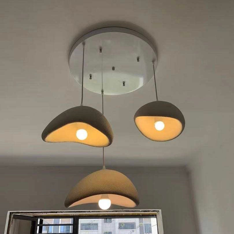 Modern Boho resin chandelier with soft glow, elegant design, and warm illumination; ideal for varied interiors and decor.