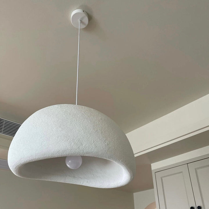 Modern Boho resin chandelier with soft glow, elegant design, and warm illumination; ideal for varied interiors and decor.
