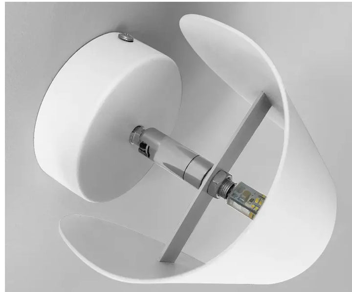 "Modern LED Up Down Wall Sconce Light, sleek black design, for indoor/outdoor use, illuminates spaces elegantly."