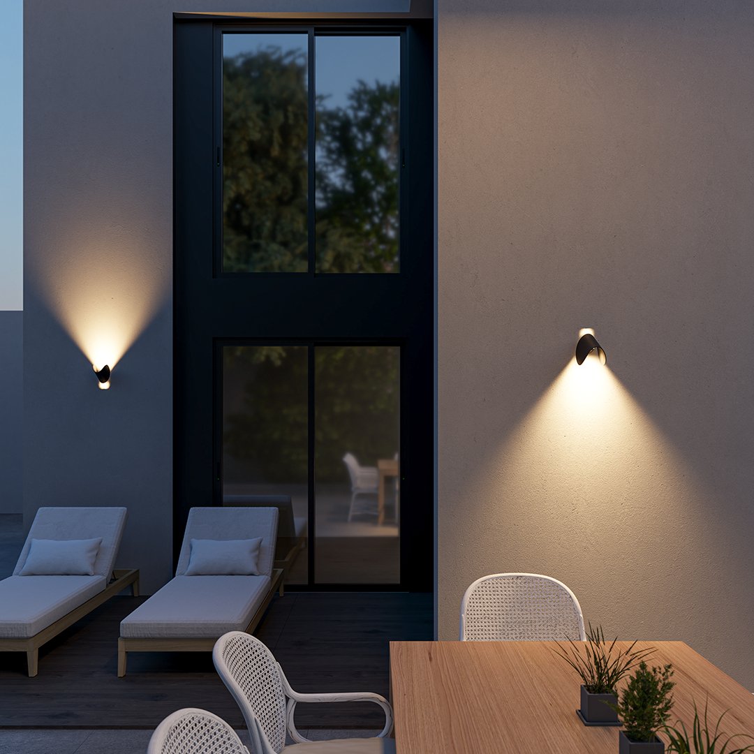 "Modern LED Up Down Wall Sconce Light, sleek black design, for indoor/outdoor use, illuminates spaces elegantly."