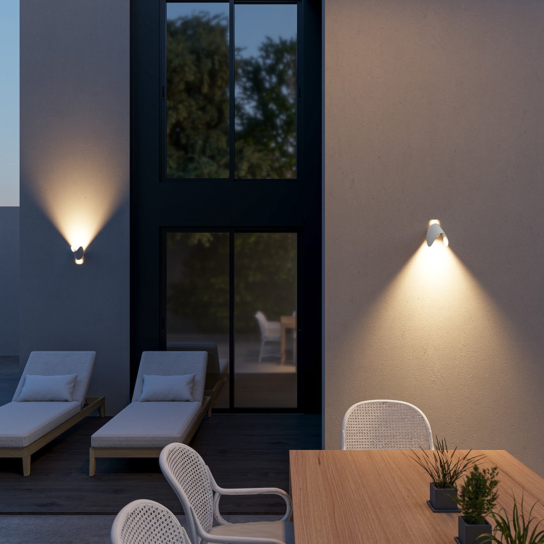 "Modern LED Up Down Wall Sconce Light, sleek black design, for indoor/outdoor use, illuminates spaces elegantly."