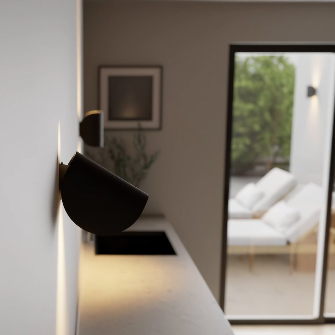 "Modern LED Up Down Wall Sconce Light, sleek black design, for indoor/outdoor use, illuminates spaces elegantly."