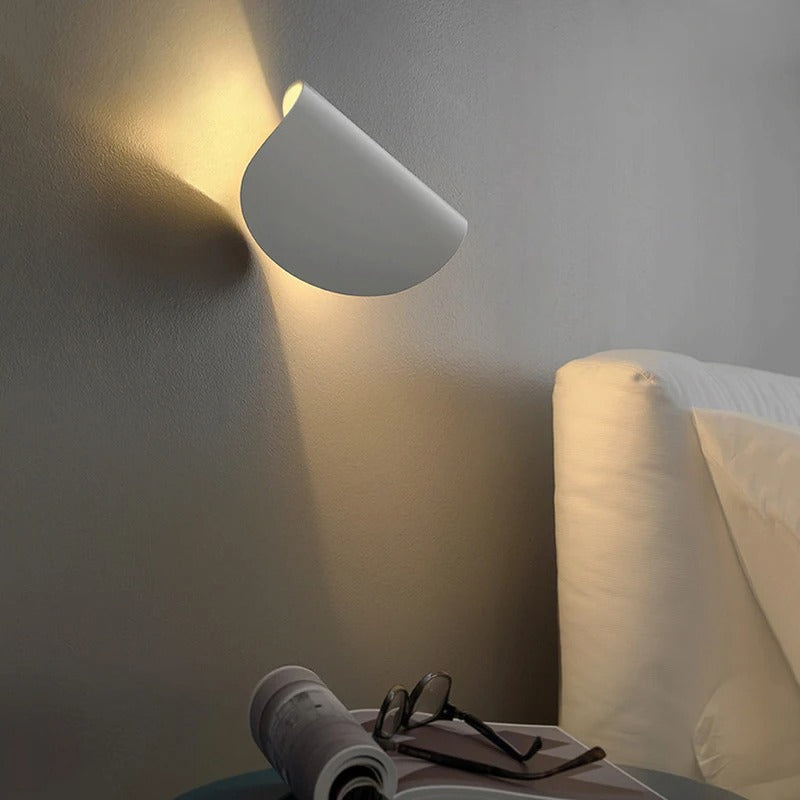 "Modern LED Up Down Wall Sconce Light, sleek black design, for indoor/outdoor use, illuminates spaces elegantly."