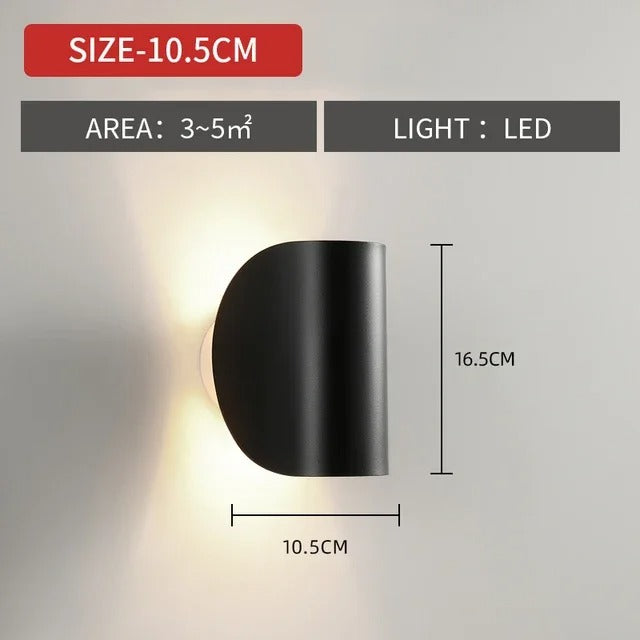 "Modern LED Up Down Wall Sconce Light, sleek black design, for indoor/outdoor use, illuminates spaces elegantly."