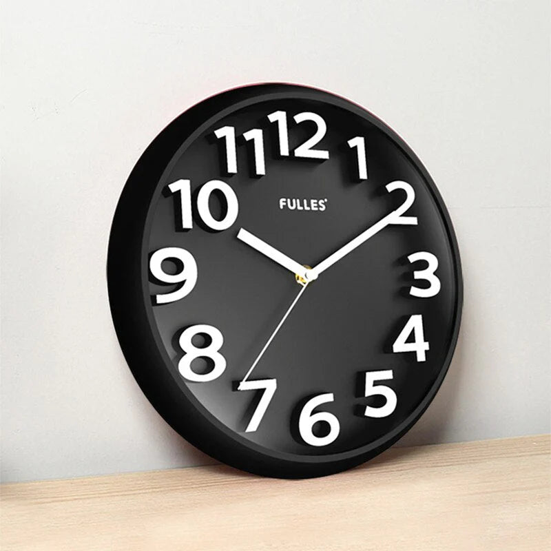Modern minimalist wall clock with sleek black rim and silent operation, enhancing any room with its sophisticated design.