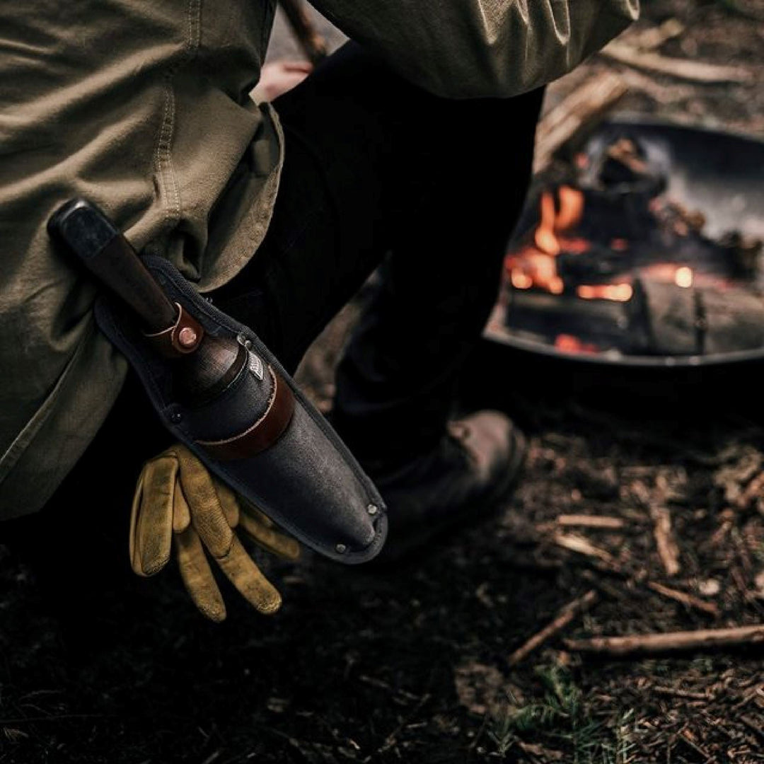 "Multi-Purpose Hori Hori Garden Knife with stainless steel blade and walnut handle for camping, foraging, and gardening."