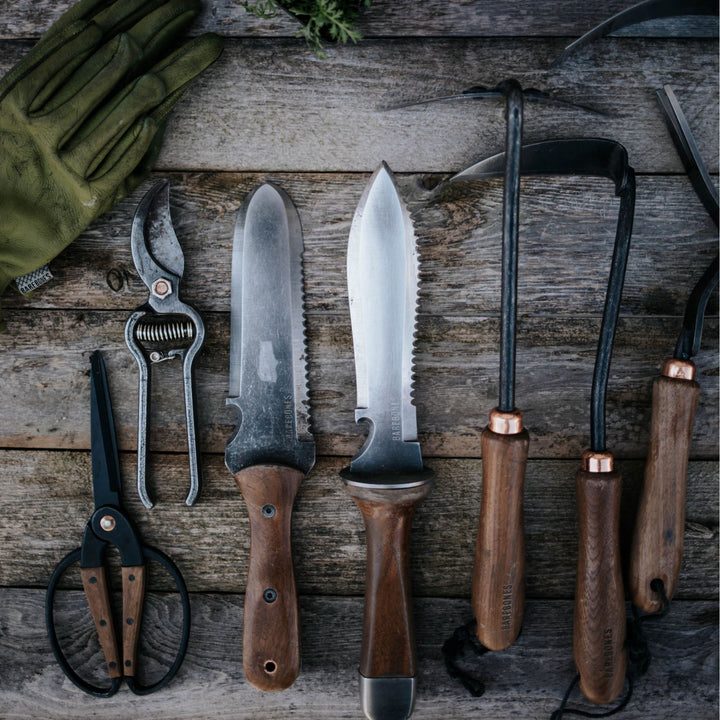 "Multi-Purpose Hori Hori Garden Knife with stainless steel blade and walnut handle for camping, foraging, and gardening."