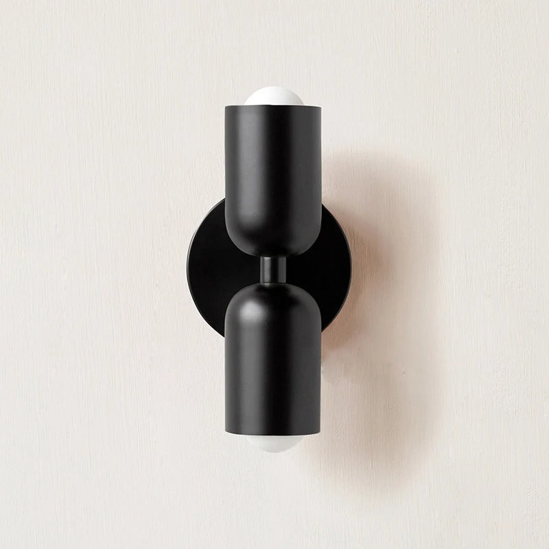 Nordic double-headed LED wall lamp with minimalist design, cozy ambiance, ideal for living room or bedroom accent lighting.