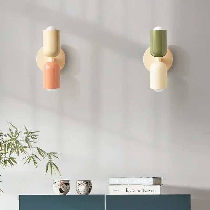 Nordic double-headed LED wall lamp with minimalist design, cozy ambiance, ideal for living room or bedroom accent lighting.