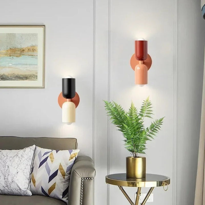 Nordic double-headed LED wall lamp with minimalist design, cozy ambiance, ideal for living room or bedroom accent lighting.