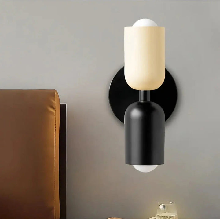 Nordic double-headed LED wall lamp with minimalist design, cozy ambiance, ideal for living room or bedroom accent lighting.