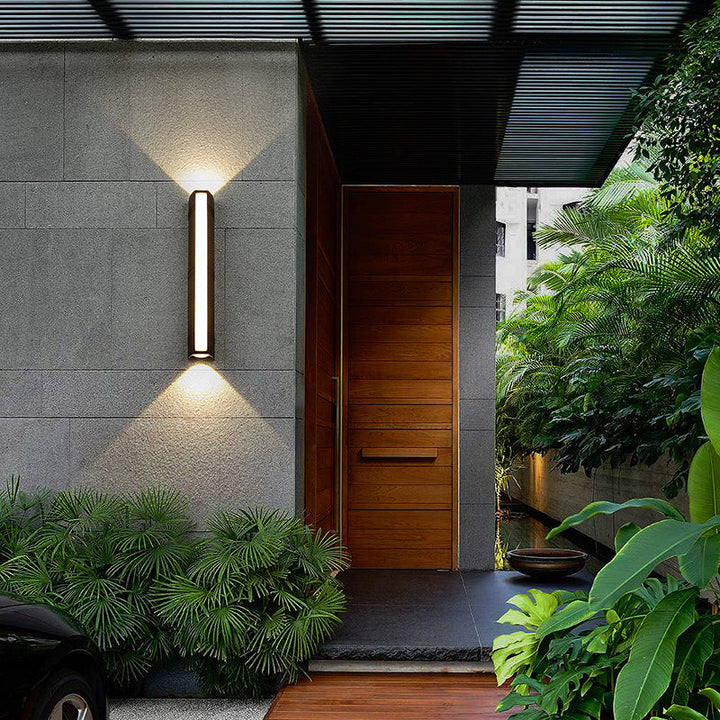 Outdoor wall light with LED technology, rustproof aluminum, sleek design, waterproof, ideal for garden or patio lighting.