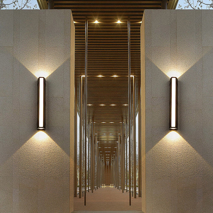 Outdoor wall light with LED technology, rustproof aluminum, sleek design, waterproof, ideal for garden or patio lighting.