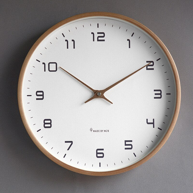 Scandinavian minimalist wooden wall clock with a simple circular design, cream and brown colors, fits modern home interiors.
