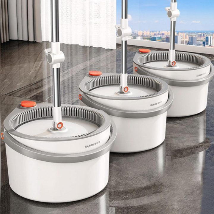 "Self-cleaning spin mop with microfiber, adjustable handle, and 360° rotation; ideal for hardwood, tile, and vinyl floors."
