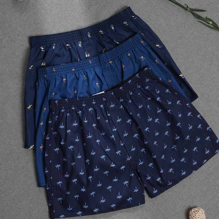 "Set of 3 men's cotton boxers with modern plant print, non-elastic fit, breathable 100% cotton for everyday comfort."