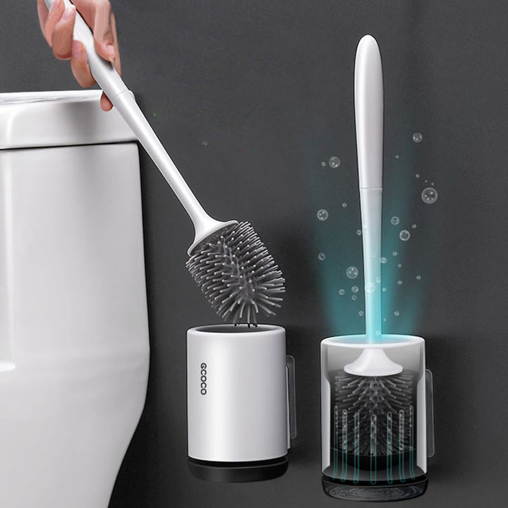 "Silicone toilet brush with non-scratch bristles, white wall-mounted design, keeps bathrooms pristine and surfaces undamaged.