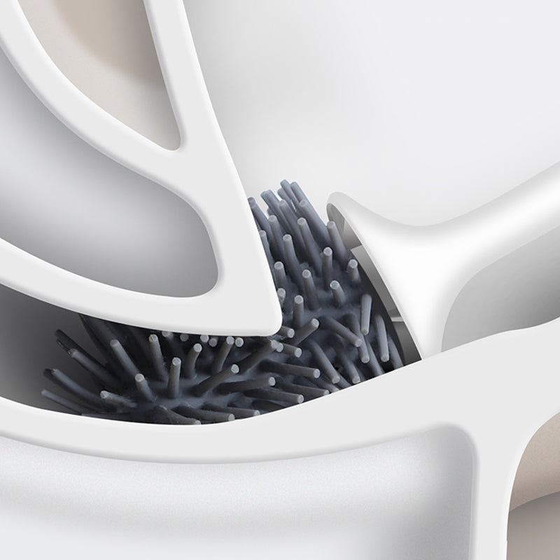 "Silicone toilet brush with non-scratch bristles, white wall-mounted design, keeps bathrooms pristine and surfaces undamaged.