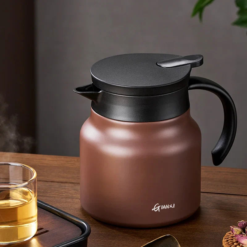 "Sleek insulated teapot with infuser, ceramic steel liners, 800ml capacity, in stylish brown, perfect for hot or cold drinks.