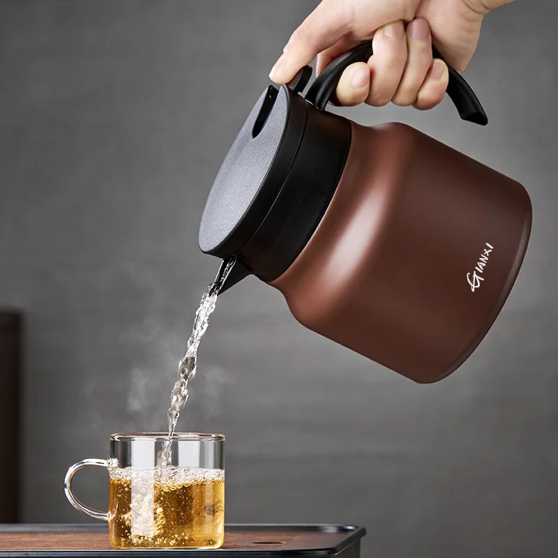 "Sleek insulated teapot with infuser, ceramic steel liners, 800ml capacity, in stylish brown, perfect for hot or cold drinks.