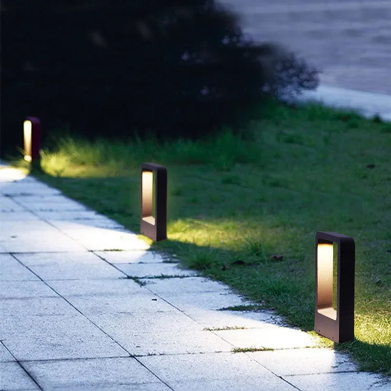 Sleek weatherproof garden bollard light, modern LED design in black and gray, perfect for outdoor pathways and patios.