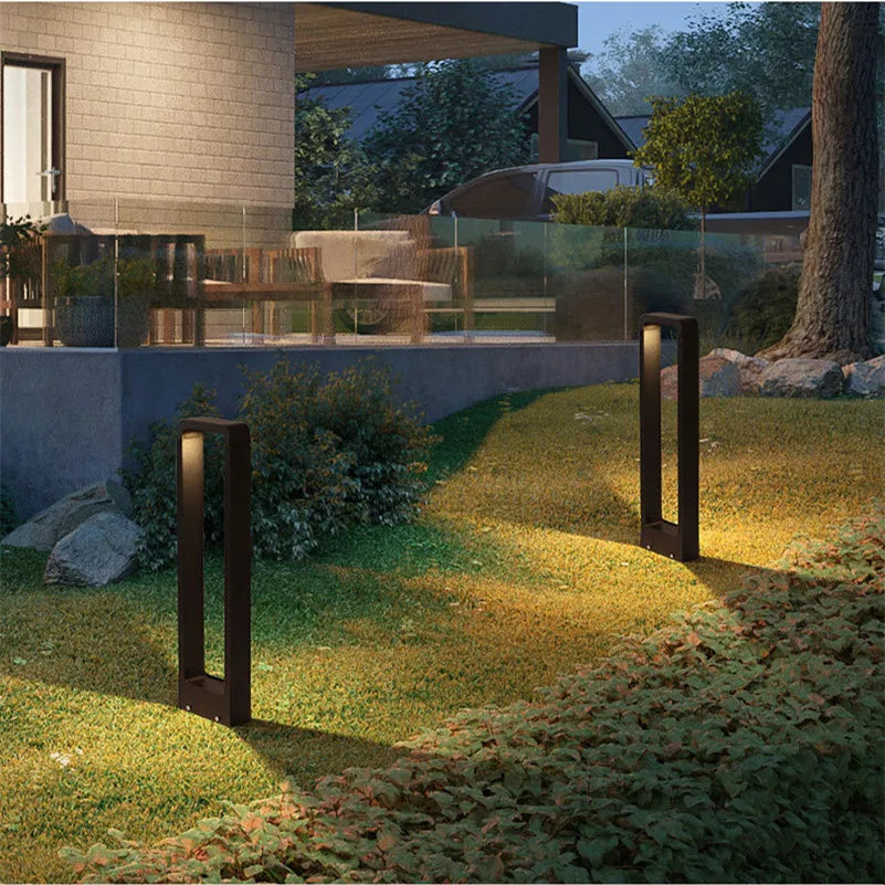 Sleek weatherproof garden bollard light, modern LED design in black and gray, perfect for outdoor pathways and patios.