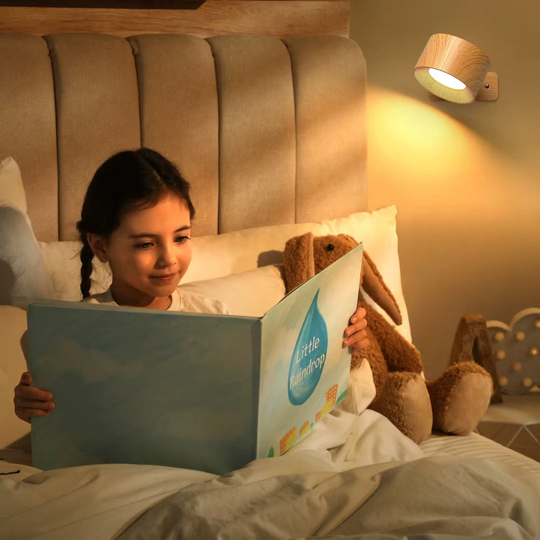 "Sleek wireless rechargeable wall light with magnetic mount and 360° rotation for modern home interiors."