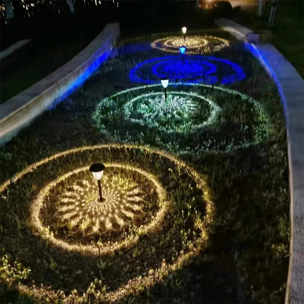 "Solar LED Mandala Garden Light casting intricate shadows on pathway, showcasing artistic outdoor illumination at night."