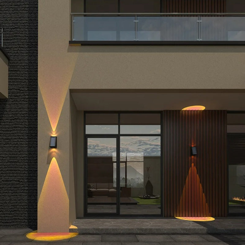 "Solar LED outdoor wall light illuminating up and down; eco-friendly, weather-resistant, elegant design; multiple light color