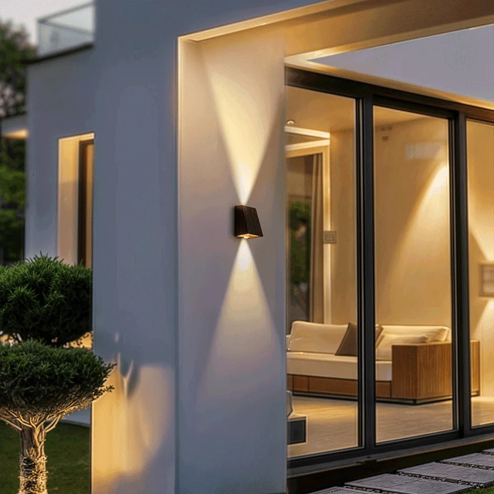 "Solar LED outdoor wall light illuminating up and down; eco-friendly, weather-resistant, elegant design; multiple light color